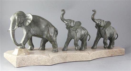 Brault. An Art Deco bronze group of elephants, height 11.5in. length 30in.
